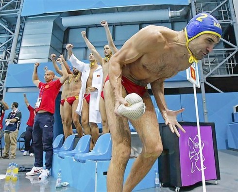 Montenegro's Brguljan and the bench celebrate a goal against Spain during their Men's Quarterfinal water polo match during the London 2012 Olympic Games